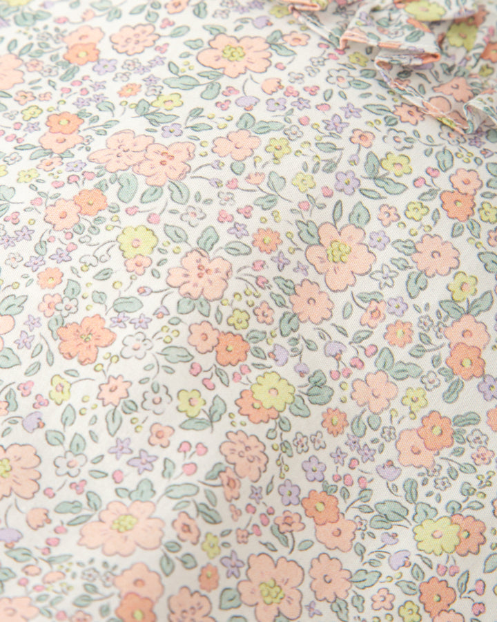 PELELE CORTO SIN MANGAS FLORES PÉTALO