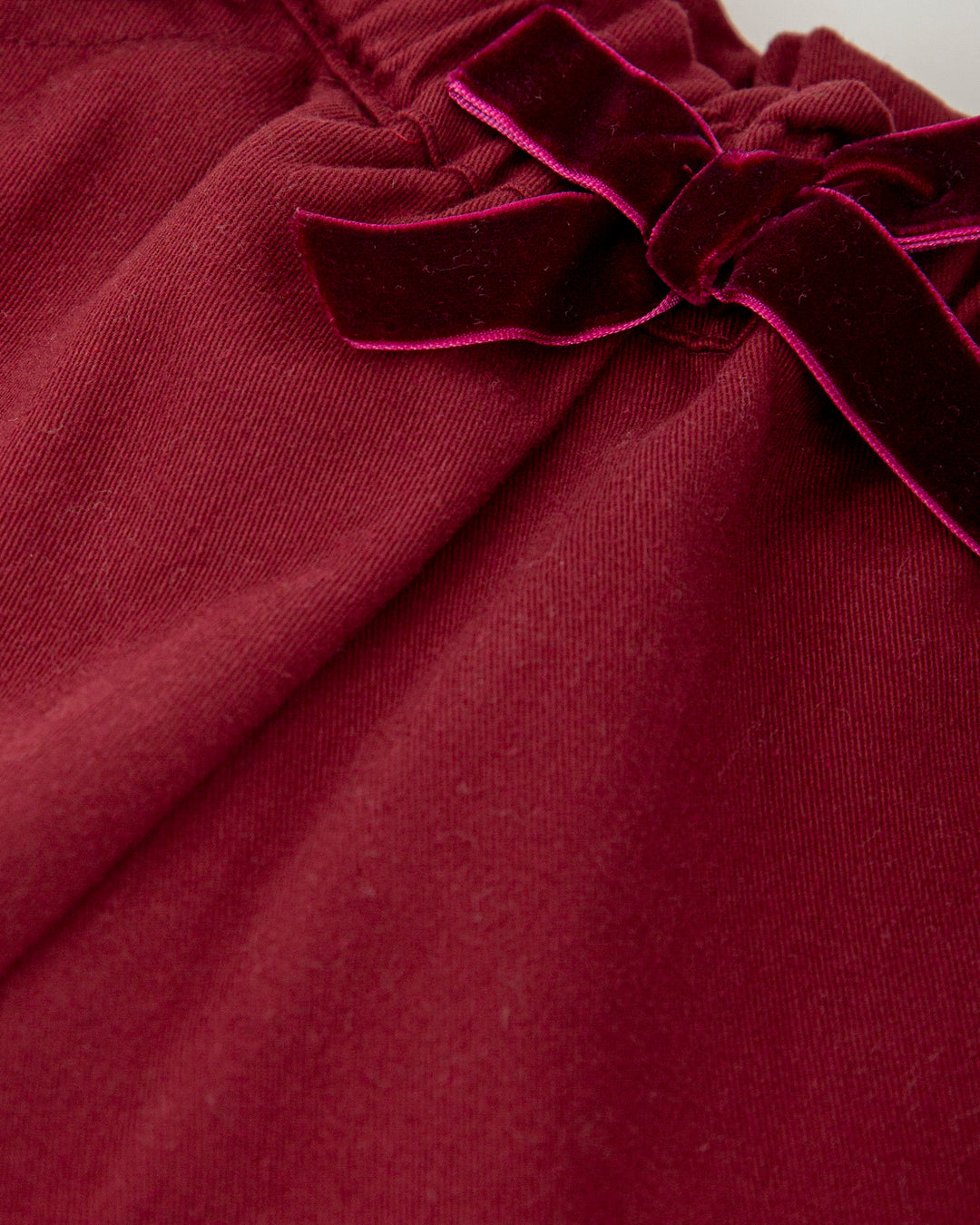 SHORTS GRANATE CON LEOTARDOS